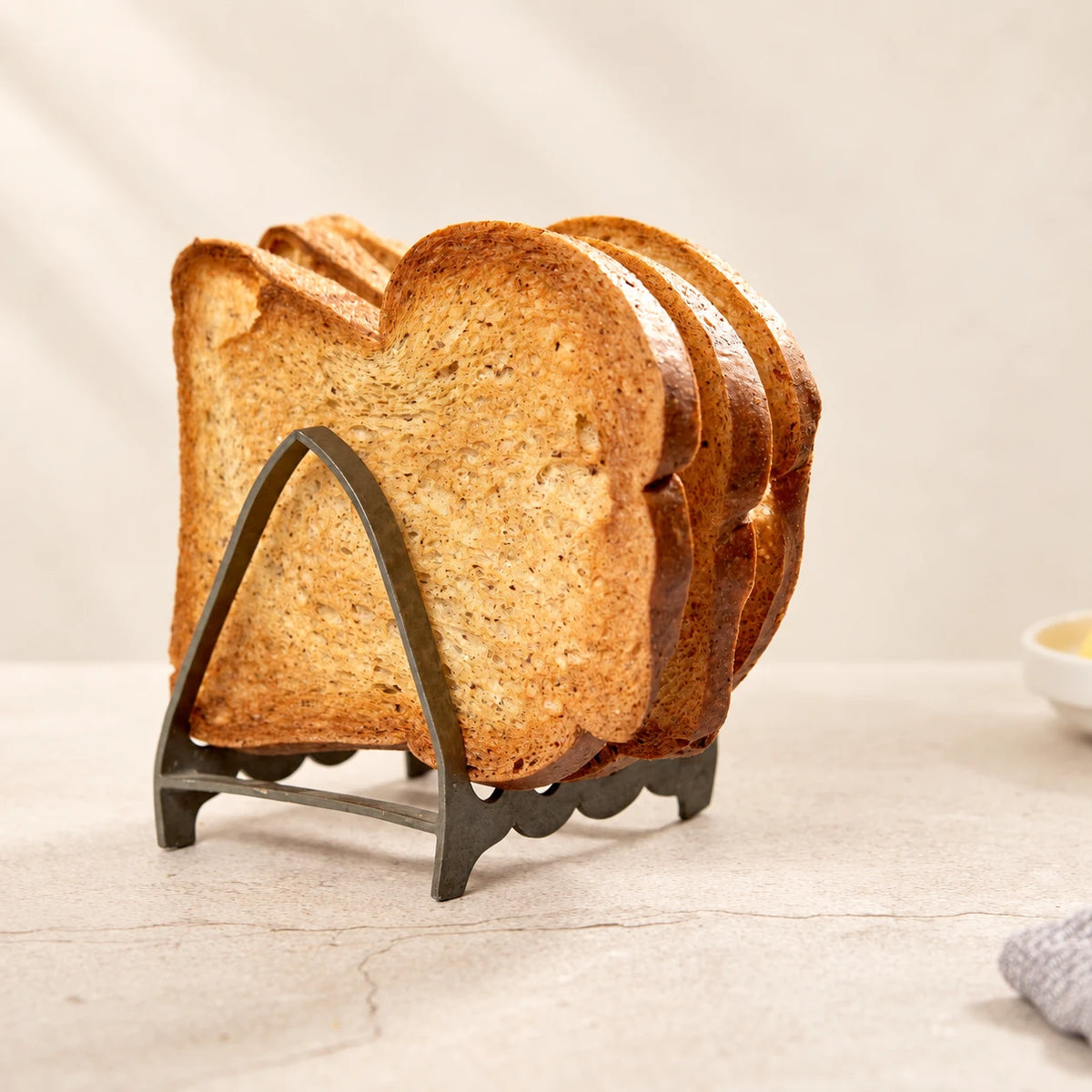 Toasted slices of SRSLY low carb bread arranged in a toast rack