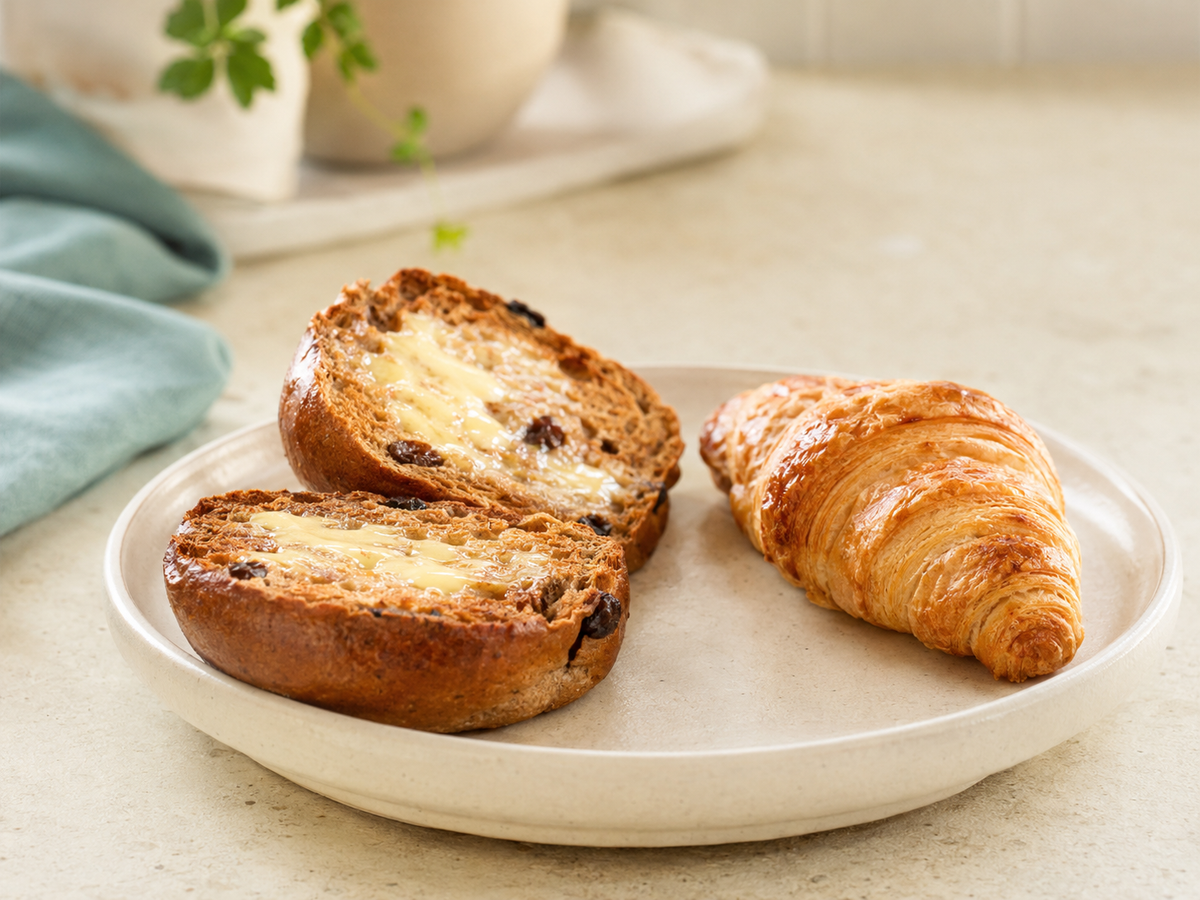 Warm low-carb fruit bun and protein croissant prepared in an air fryer