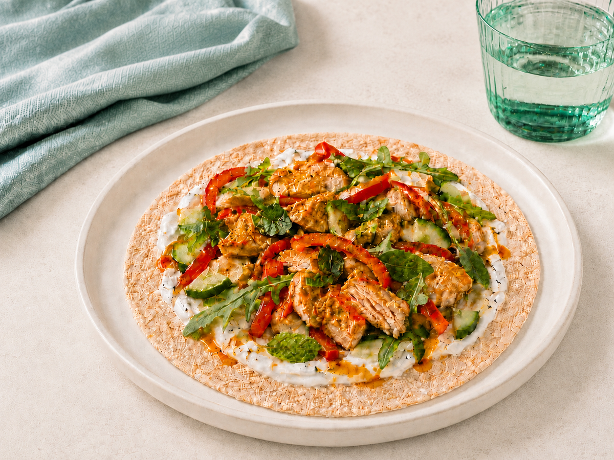 SRSLY wrap topped with chicken and colourful vegetables